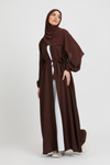 Full front view of brown kimono abaya with white inner slip dress and elasticated cuffs, elegant modest abaya for women in Pakistan