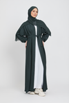 Full front view of green kimono abaya with white slip dress, elegant modest abaya for women in Pakistan