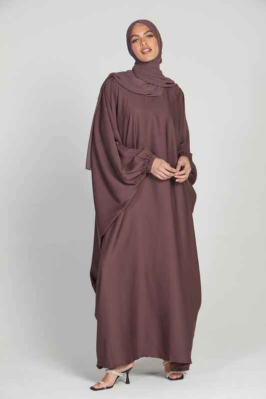Elegant front view of stylish pink abaya dress in kaftan style, modest abaya with elastic sleeves