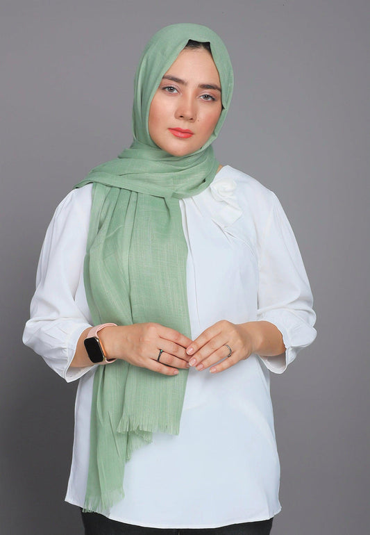 Close-up of Turkish Viscose Hijab in Apple Green showing smooth viscose texture and premium shine