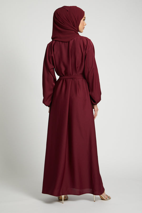 Back full view of red kimono abaya with belt and long sleeves, modest abaya style for women in Pakistan