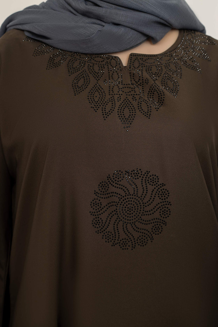 Zoom-in close-up on chest area design of butterfly sleeve abaya, stylish and elegant abaya for women in Pakistan