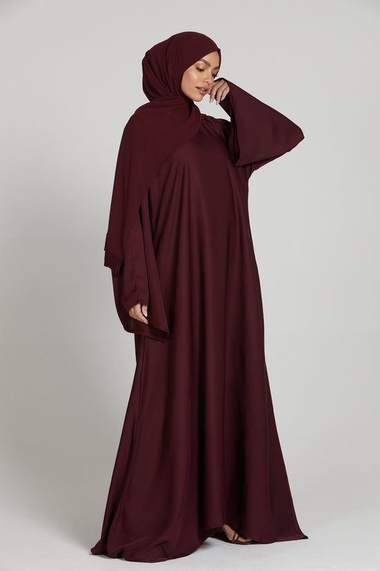 Elegant front view of maroon abaya with long sleeves, simple and stylish modest outfit for women