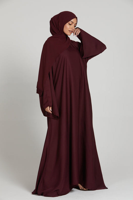 Elegant front view of maroon abaya with long sleeves, simple and stylish modest outfit for women