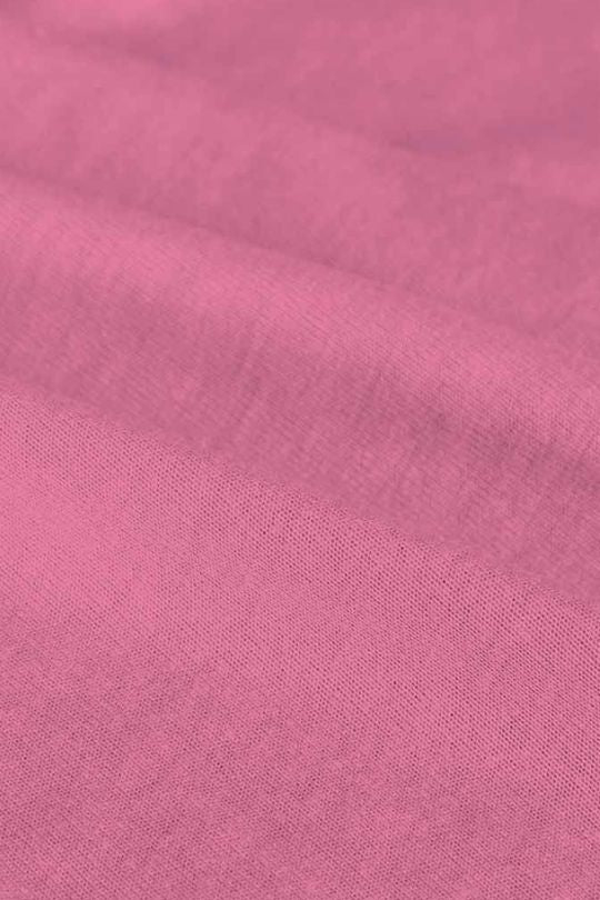 Close-up of pink fabric with a subtle texture