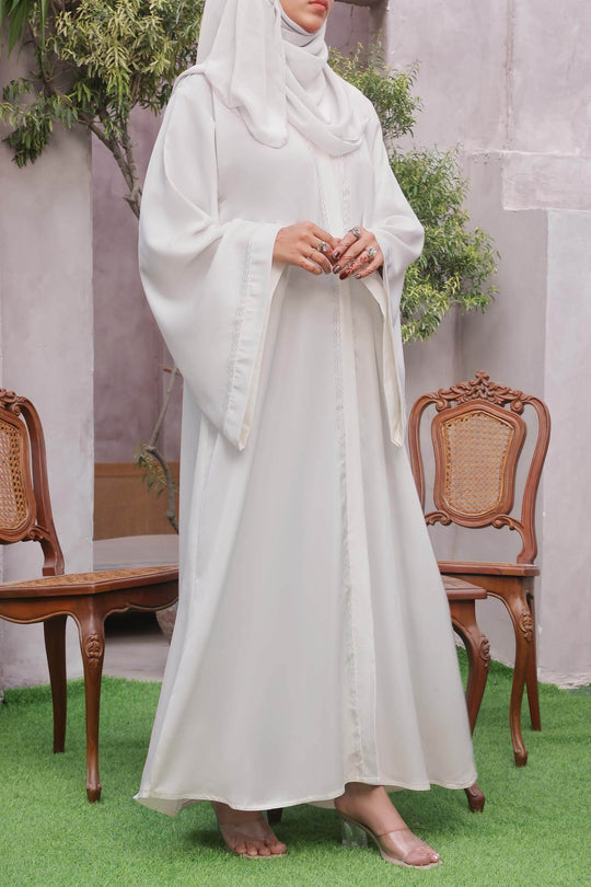 Right side full view of elegant white Nida fabric abaya for women, premium modest fashion Pakistan