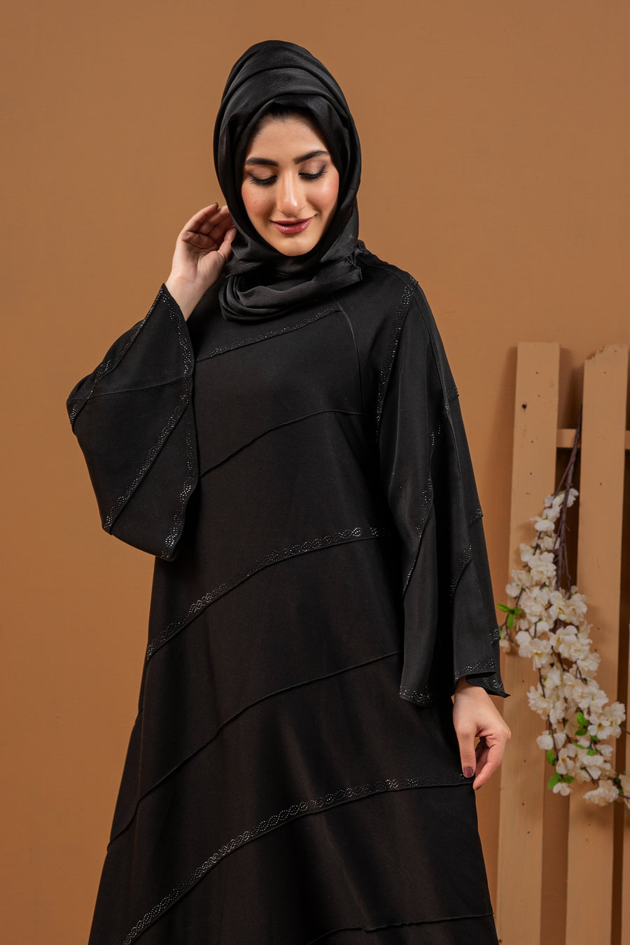 Detailed zoom-in of fabric texture and sleeve style of full pintex abaya, elegant Islamic modest dress for women