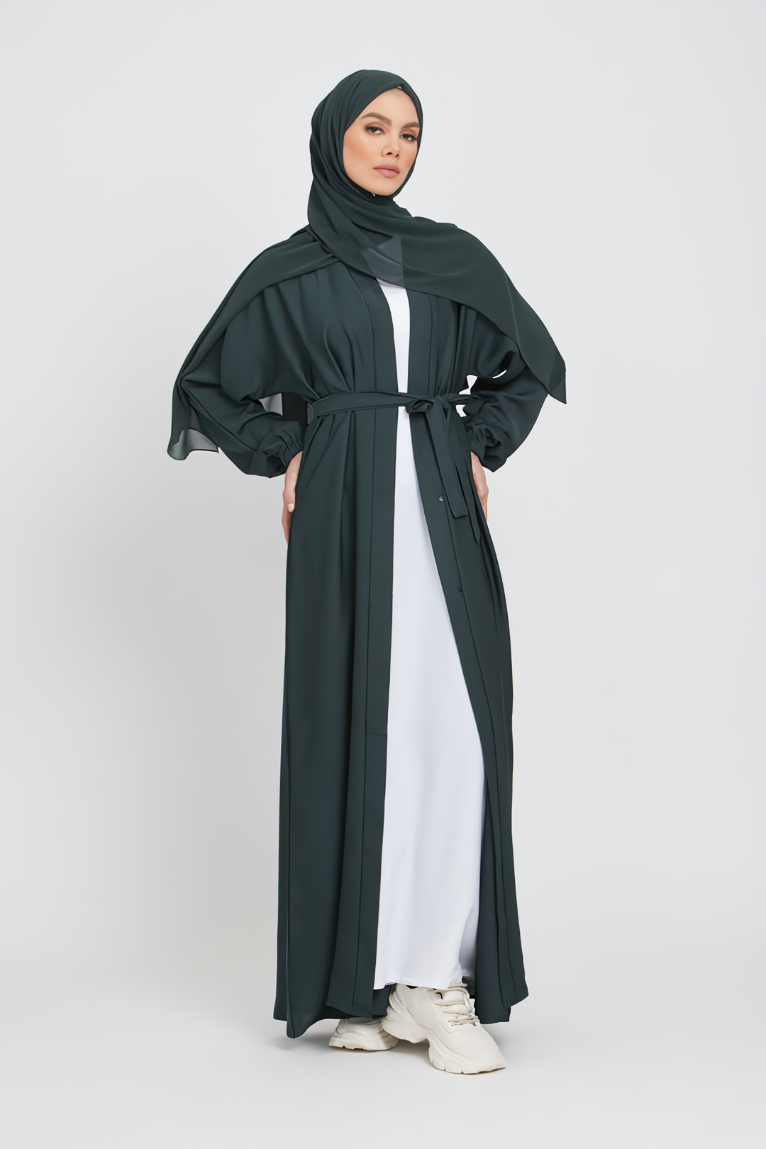 Full front view of green kimono abaya with white slip dress, elegant modest abaya for women in Pakistan