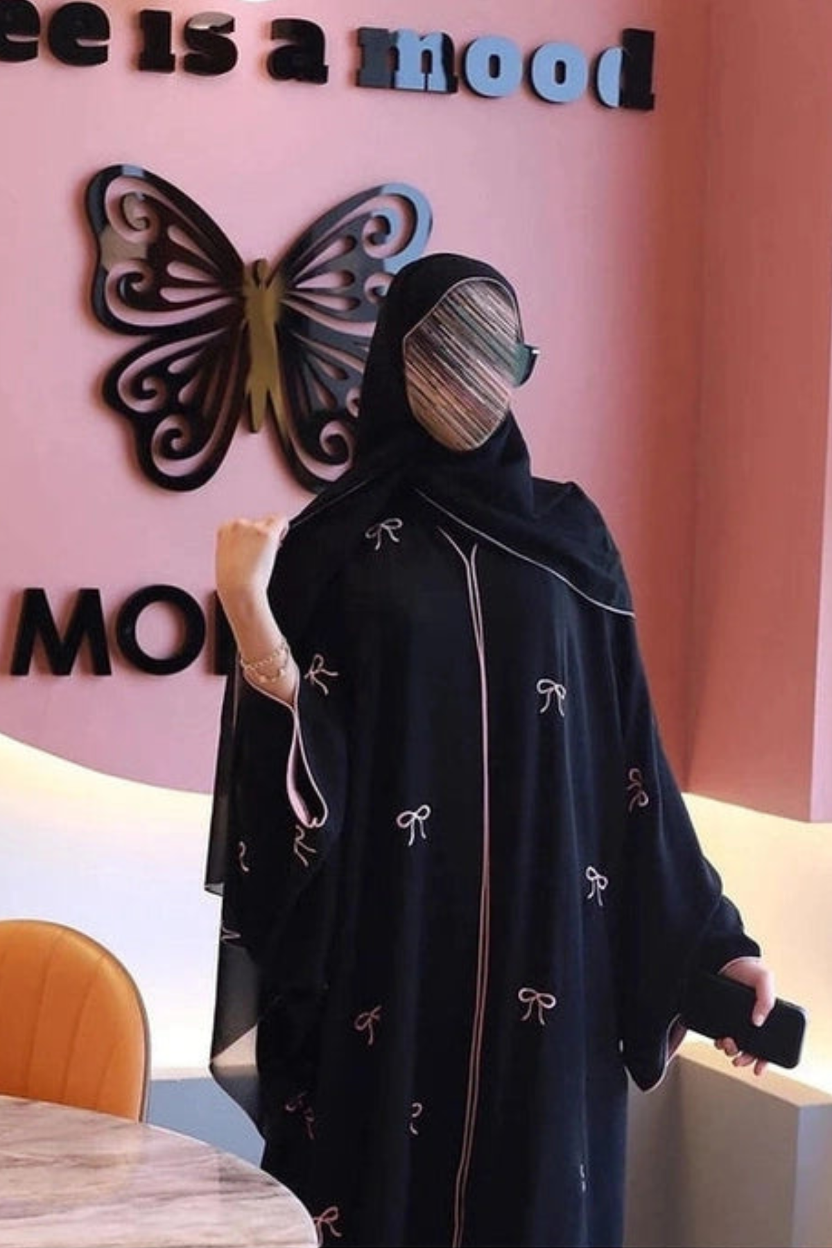 Front view of Top Trendy Luxe Bow Abaya showing elegant bow design, premium nida fabric, and modest fashion style for women