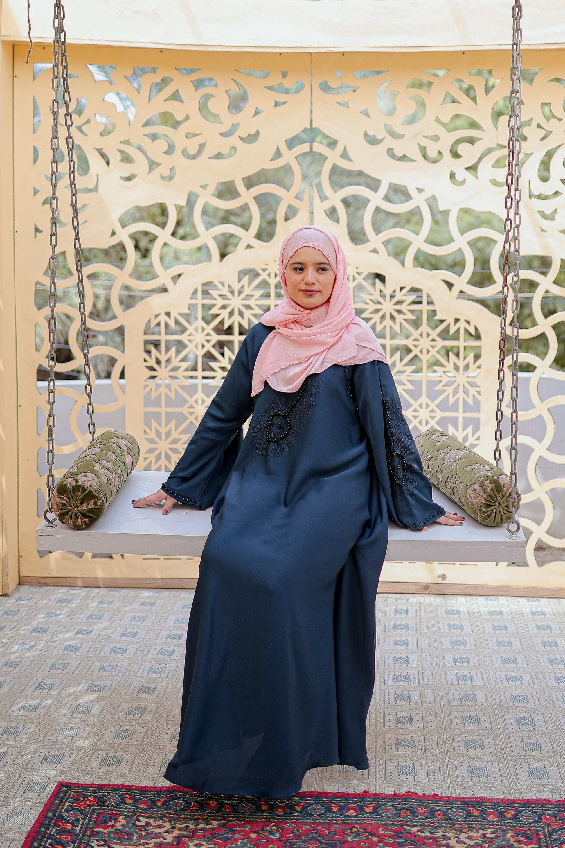 Elegant side view of white abaya featuring nug and moti work on neck and sleeves, perfect modest fashion abaya for women