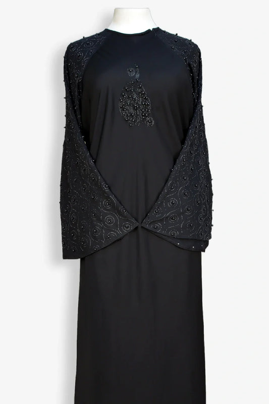 Close-up zoom of pearl sleeve embellishment with 800 moti work on black abaya, stylish modest abaya design for women, online shopping Pakistan
