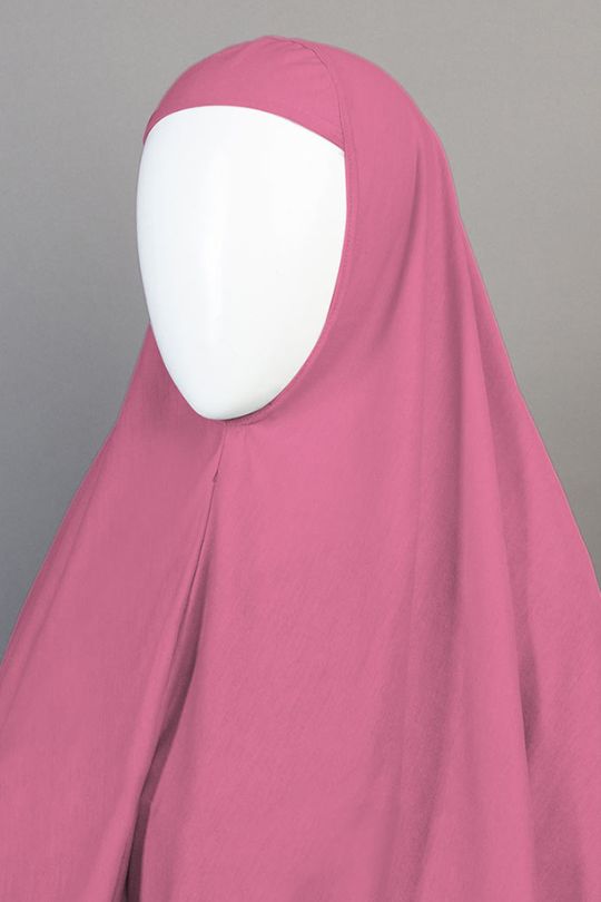 Pink hijab on a mannequin with a gray background