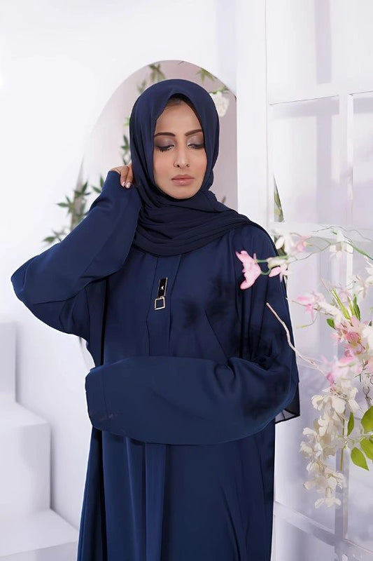Zoom-in of front view of Plain Navy Blue Abaya in luxurious nida fabric highlighting neckline, premium stitching, and modest design details