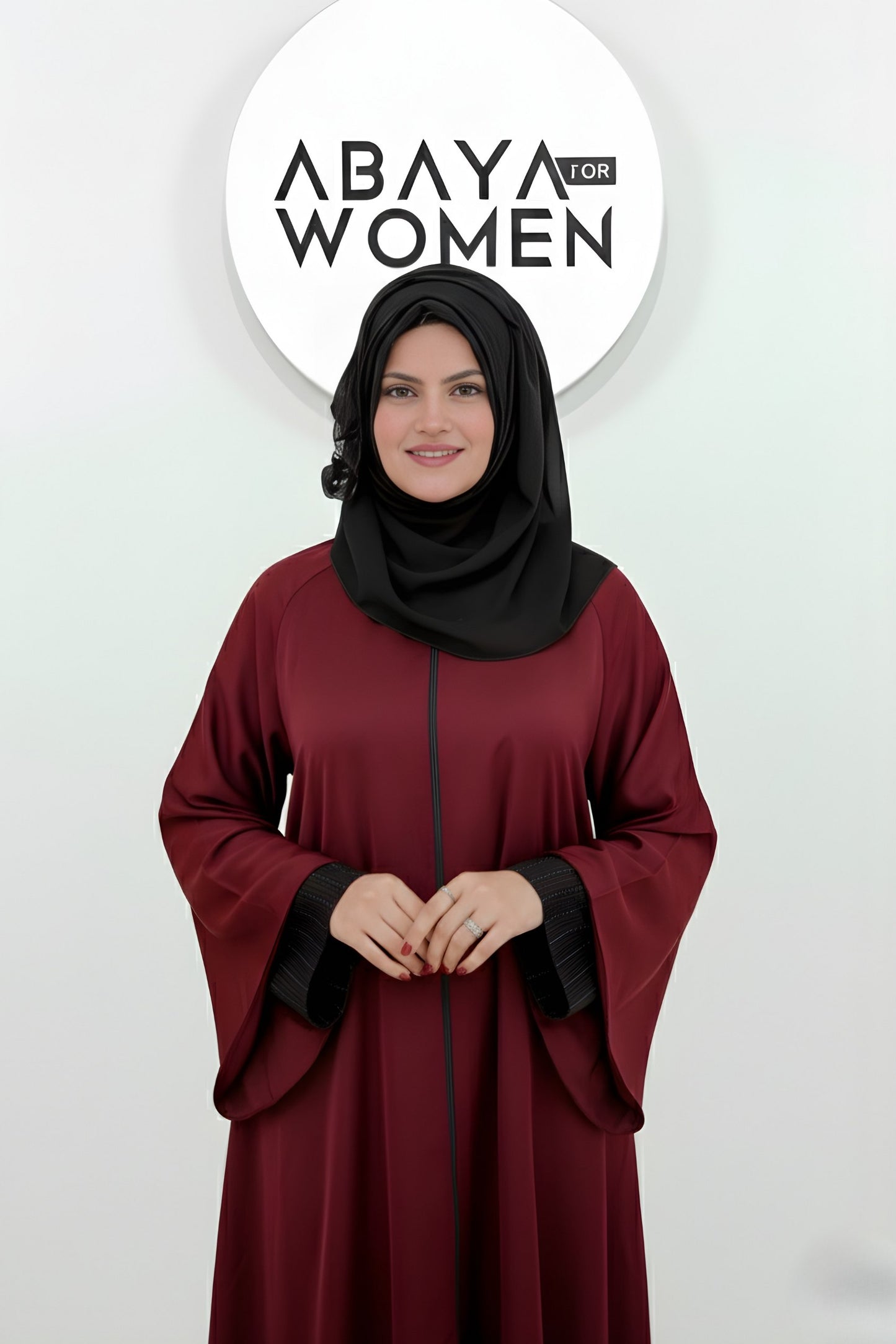 Premium fabric and fine stitching front detail of maroon front open zipper abaya