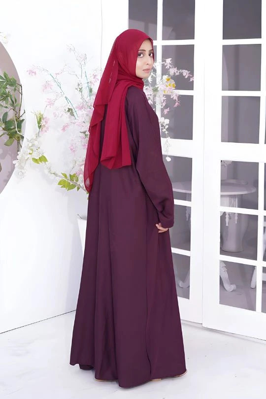 Back view of Premium Plain Abaya in Old Mauve shade highlighting full coverage and graceful nida fabric design