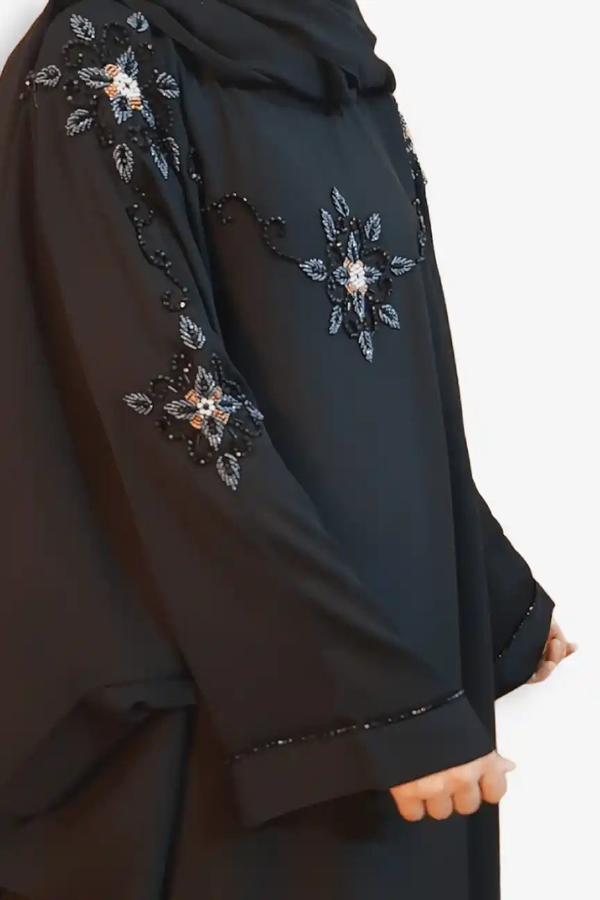 Modern side view of baggy style abaya featuring hand work embellishment, modest fashion abaya for women in Pakistan