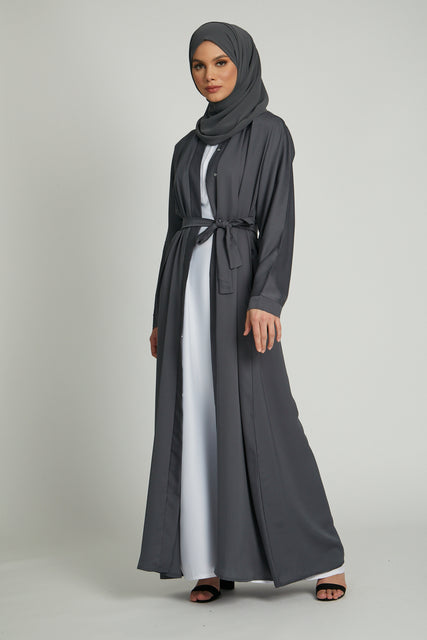 Side full view of grey kimono abaya layered with white inner slip dress, elegant modest wear for women