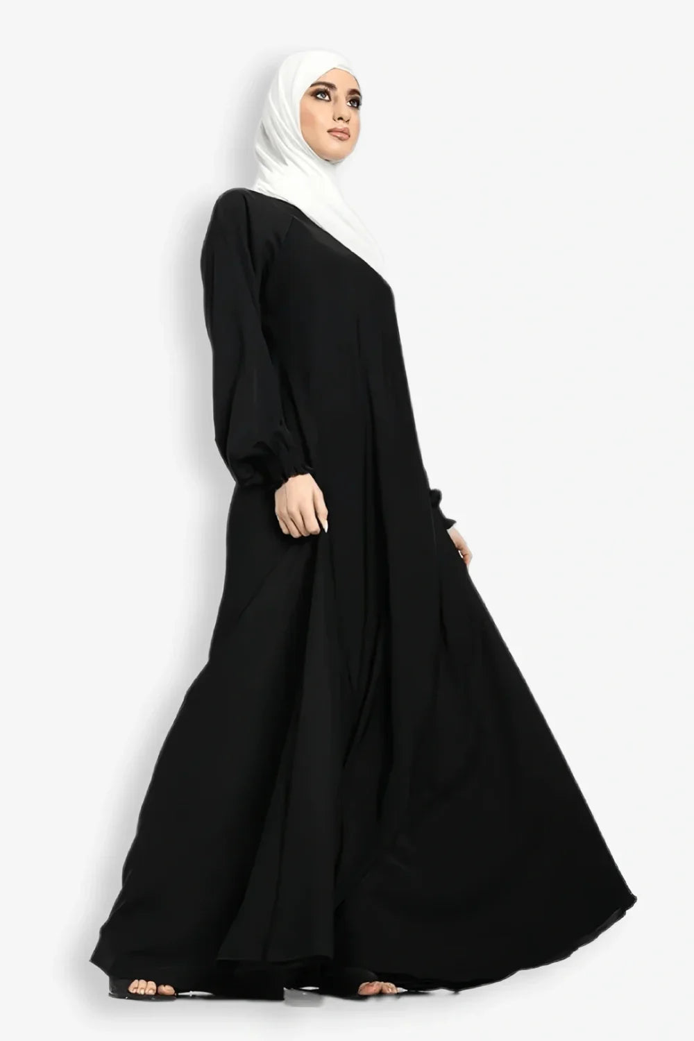Side full view of plain umbrella abaya in black with bottom gair and loose modest design, elegant abaya dress for women