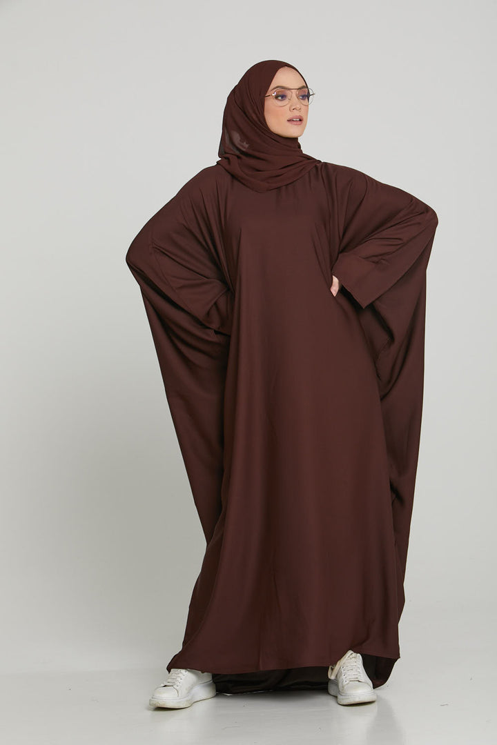 Front full view of stylish dark brown abaya in kaftan butterfly design, modest abaya for women in Pakistan
