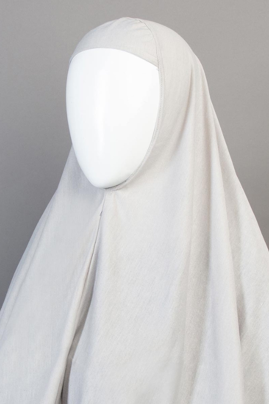 White hijab on a gray background